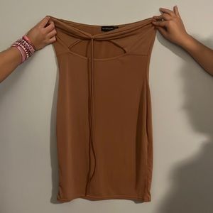 Camel colored strapless dress with cutout